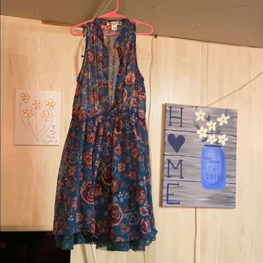 Nice dress to spin in.. buttons up the front